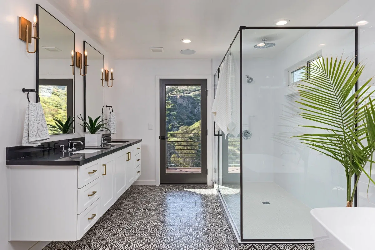 Bright white bathroom with frameless shower and double vanity, bathroom renovations Eaglemont